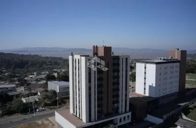 Apartamento totalmente mobiliado no centro de guaíba em condomínio alto padrão