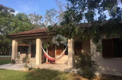 Sítio no guaíba country clube - com casa, piscina e muita área arborizada - parque eldorado