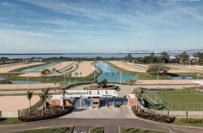 Terreno no condominio península ponta da figueira em eldorado do sul.