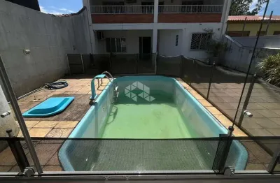 Casa à venda com 3 quartos e 2 vagas no centro de guaíba