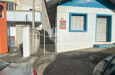 Ótimo ponto comercial à venda no centro de guaiba. nos fundos casa 1 dormitório.