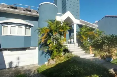 Casa à venda com 3 quartos, 2 vagas no centro de guaíba com vista panorâmica para o guaíba