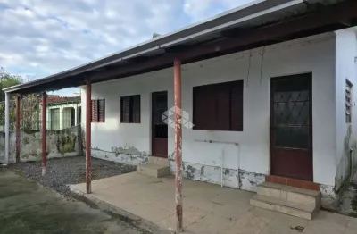 Terreno à venda com 3 casas no bairro estância velha em canoas, 352m2 com 3 casas.