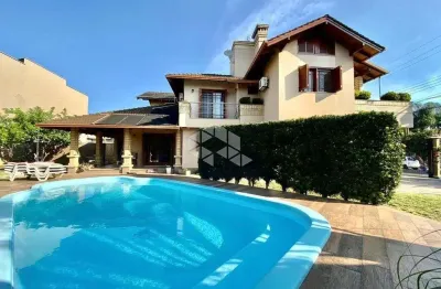Sobrado 4 dormitórios , pátio com piscina no bairro bela vista - canoas /rs