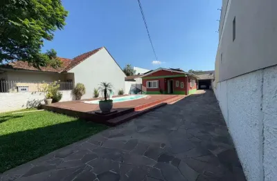 Casa no centro de esteio/rs com 3 dormitórios piscina e pátio privativo.