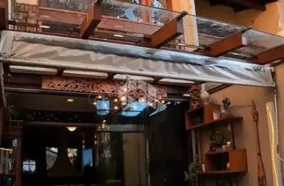 Casa à venda em condomínio fechado com 3 quartos, 2 vagas de garagem, bairro tristeza, poa/rs