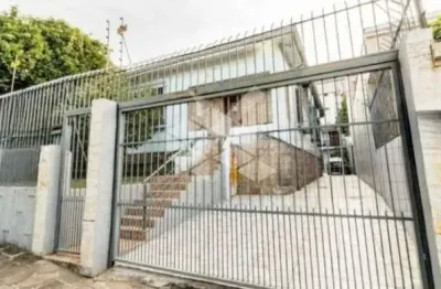 Casa à venda com 5 quartos, 4 banheiros,  5 vagas de garagem, piscina, no bairro santo antônio, poa/rs