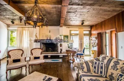 Casa à venda com vista pro guaíba, 347m² privativos, 3 suítes, no bairro tristeza.