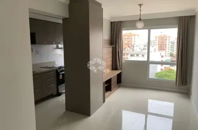 Apartamento com dois dormitórios e vaga de garagem em porto alegre.