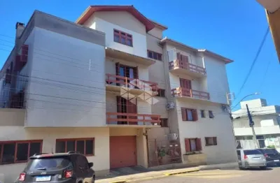 Apartamento com 3 dormitórios e 2 vagas de garagem no centro de vacaria!