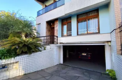Casa com 3 quartos à venda na Rua Filipinas, 140, Jardim Lindóia, Porto Alegre