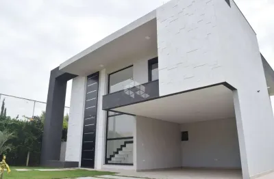 Linda casa em condomínio fechado, 4 suítes, 600m² terreno, para vender por r$ 2.700.000