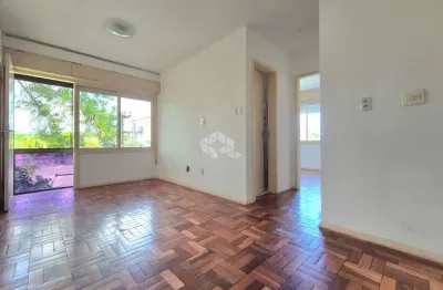 Apartamento com 1 dormitório, com sacada e vaga coberta no bairro Santa Maria Goretti, em Porto Alegre