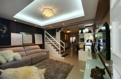 Casa em condomínio fechado no bairro humaitá em porto alegre.