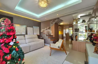 Casa em condomínio fechado no bairro humaitá em porto alegre.