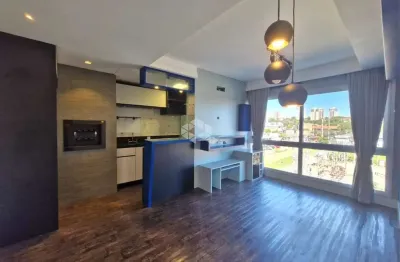 Apartamento semi mobiliado de 2 dormitórios com suíte e 3 vagas de garagem no bairro Passo da Areia