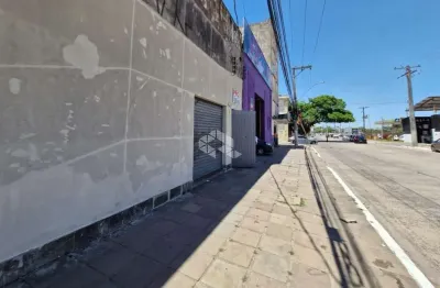Prédio comercial, pátio, churrasqueira, no bairro Navegantes, em Porto Alegre.