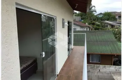 Oportunidade para Investidor: Casa com Renda Garantida no Rio Tavares | 2 Suítes - Pagamento à Vista