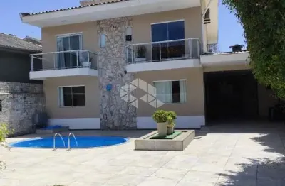 CASA DE ALTO PADRAO A VENDA NA PRAIA DO CAMPECHE - 50 METROS DO MAR - PORTEIRA FECHADA - Florianopolis