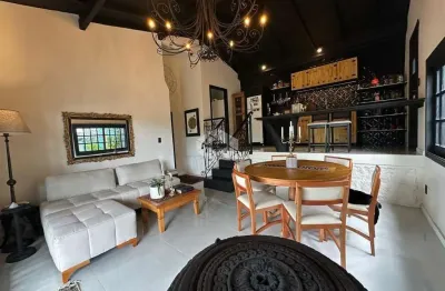 Paraíso residencial à venda no santinho: casa duplex mobiliada com vista mar e stúdio privativo em florianópolis