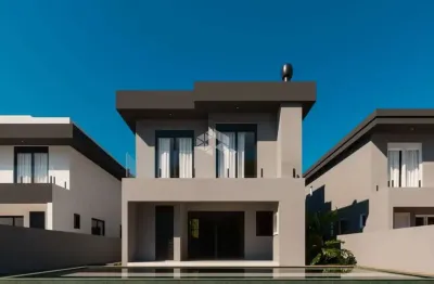Casa com 03 suítes em cacupé / sc  fino acabamento, piscina e próximo ao comércio local.