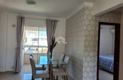 Apartamento com dois dormitórios e 1 vaga em itapema no bairro casa branca