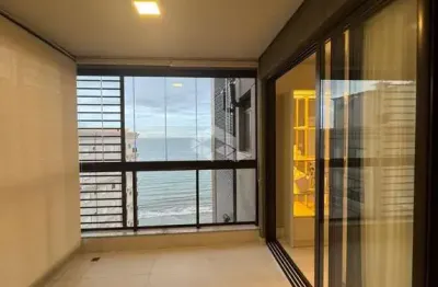Apartamento com 3 suítes e duas vagas de garagem em porto belo com vista mar mobiliado