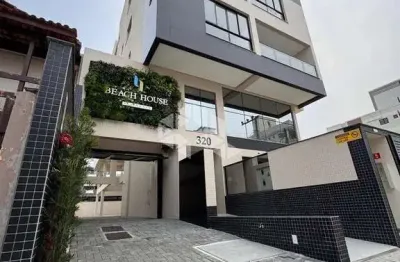 Apartamento duplex em bombinhas com duas suítes e 1 vaga de garagem, mobiliado