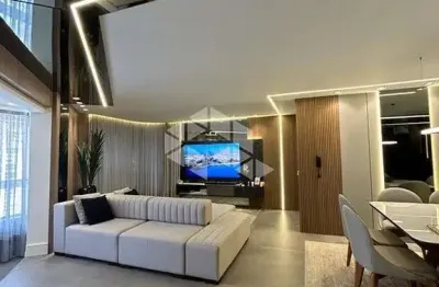 Apartamento com 4 dormitórios sendo 2 suítes e 2 vagas de garagem em itapema