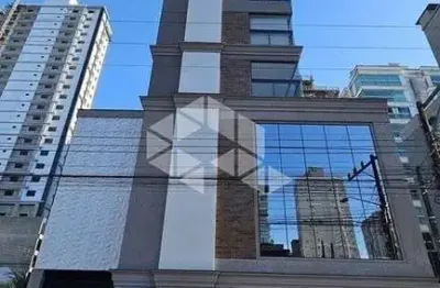 Apartamento com 3 dormitórios sendo 2 suítes e 2 vagas de garagem em itapema