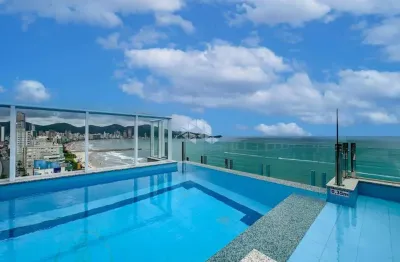 Apartamento 4 suítes com 4 vagas em itapema frente mar