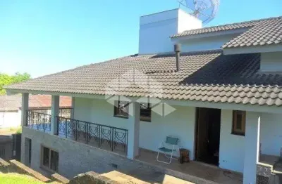 Casa com 3 dormitórios sendo 1 suíte no bairro Floresta em Estância Velha