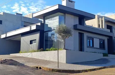 Casa de 3 dormitórios, sendo 1 suíte, garagem coberta, espaço social com piscina . Bairro Bela Vista em Estancia Velha.  Aceita Financiamento e FGTS!