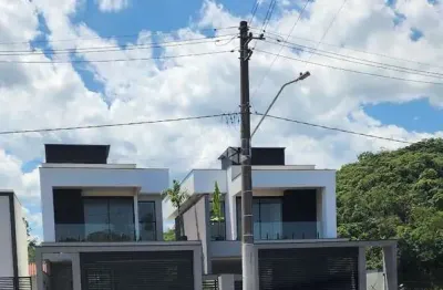 Geminado duplez alto padrão três quartos sendo duas suítes bairro três rios do norte jaraguá do sul