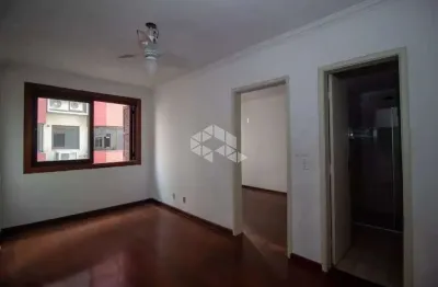 Apartamento com 01 quarto , ampla sala, banheiro e com vaga de garagem.
