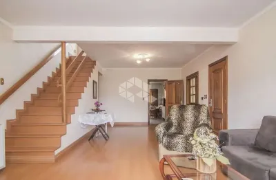 Casa com 2 dormitórios com 2 vagas, no bairro partenon em poa/rs.