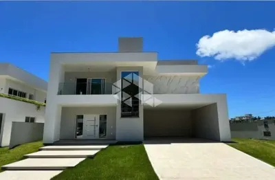 Casa de alto padrão em condomínio fechado na praia dos ingleses com 400 m², 4 quartos e 3 suítes