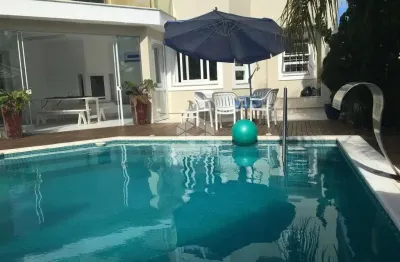 Casa com 4 quartos à venda na Rua dos Aruanãs, 81, Jurerê Internacional, Florianópolis