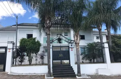 Casa dois andares com 4 suites e um loft no bairro jardim floresta