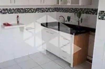 Apartamento à venda no Ipiranga, em São Paulo, com sala integrada à cozinha, dois quartos e um banheiro.