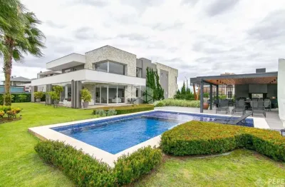 Casa a venda no condomínio eldorado ilhas park com quatro suítes.