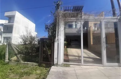 Casa com 3 quartos à venda na Rua Danton Krás Borges, 53, Guarujá, Porto Alegre