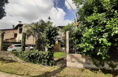 Casa com 3 dormitorios + 1 apartamento e vaga para ate 5 veiculos