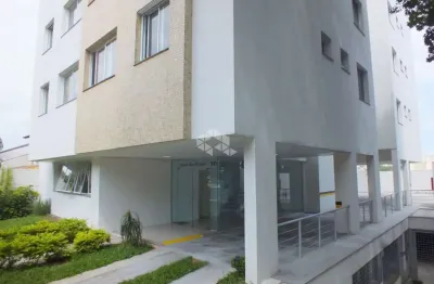 Dois dormitórios com suite duas vagas em frente a praça