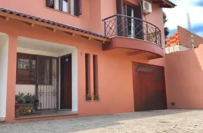 Casa em condomínio fechado com 3 quartos à venda na Rua Oscar Schneider, 83, Medianeira, Porto Alegre