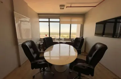 Bela sala com vaga em andar alto, com vaga e vista panorâmica.