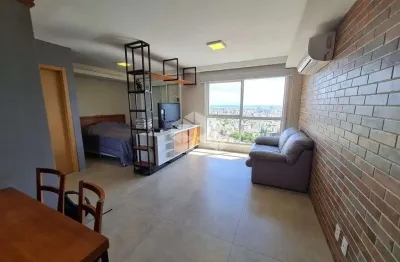 Studio de 45m2, living, cozinha com churrasqueira, banheiro social, mobiliado