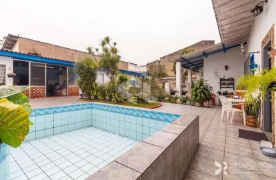 Casa 3 dormitórios com suite e piscina no bairro cavalhada