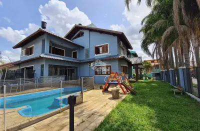 Casa com 4 quartos à venda na Rua Doutor Ladislau Ruttkay, 16, Sarandi, Porto Alegre