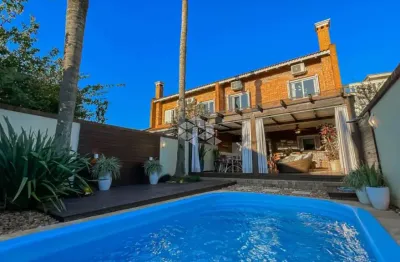 Casa de 3 suítes e 4 vagas de garagem bairro chácara das pedras